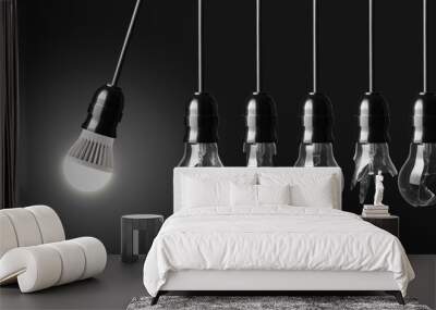 Perpetual motion with broken light bulbs and LED bulb Wall mural