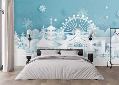 Panorama postcard and travel poster of world famous landmarks of Fukuoka, Japan in winter season with falling snow in paper cut style vector illustration Wall mural