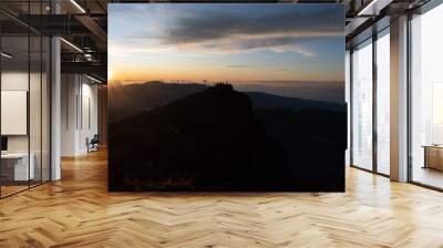 Sunrise view above the old volcano crater mountain of the Piton des Neiges, Reunion island Wall mural