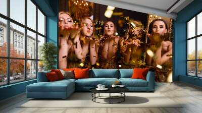 Fun party at girls, bachelorette party. New Year's party in the studio, dark background and gold decoration Wall mural