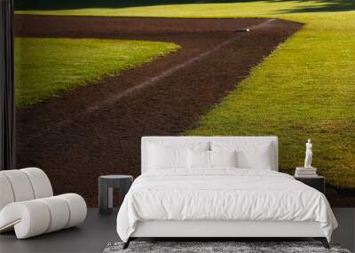 The first base on baseball field shot in the early morning. Wall mural