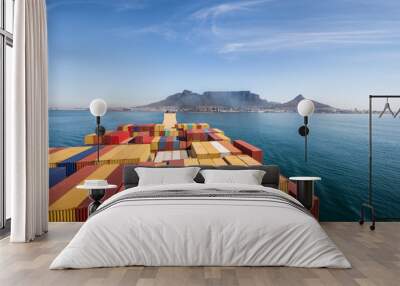 Large stacked container ship leaving the port of Cape Town with Table mountain and the city in the background, South Africa. Wall mural