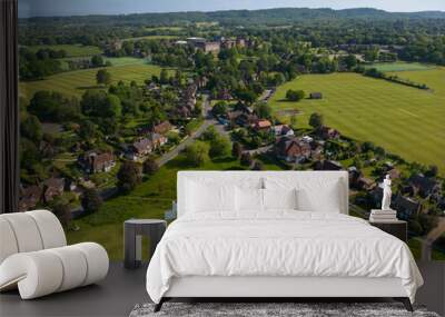 Aerial view of Cranleigh, Surrey, UK on a sunny May morning Wall mural