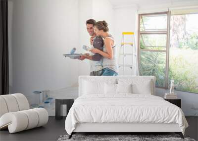 Couple painting walls Wall mural