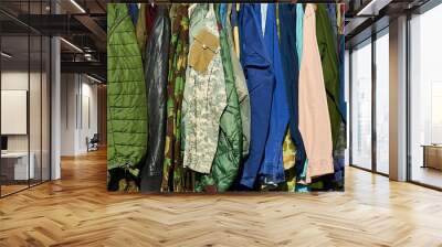 A row of jackets, coats and clothes Wall mural