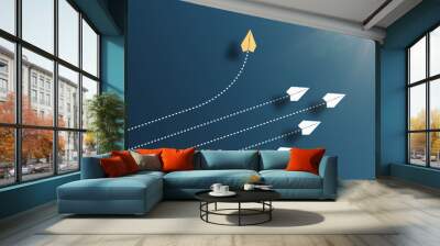 paper planes flying in formation in one direction on blue background and one paper glider going in different direction, breaking new ground and stepping out of the line concept Wall mural