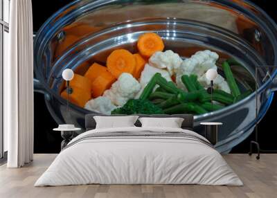 Vegetables in a stainless steel steamer prepared to be cooked with carrots, cauliflower and broccoli Wall mural