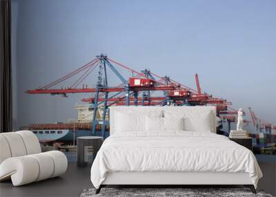 large container port with dock workers in foreground Wall mural