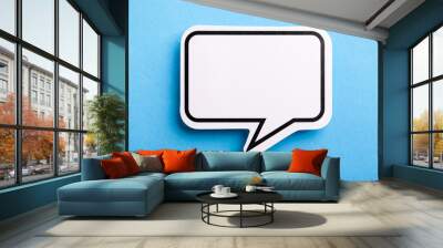 Blank Speech Bubble Isolated On Blue Wall mural