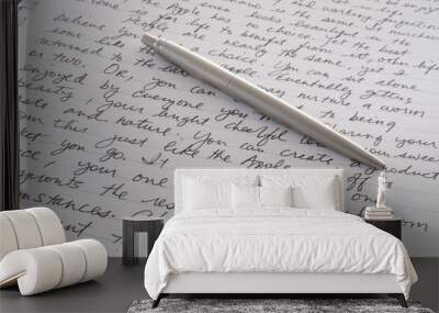 Stainless Steel Pen Laying on Written Page Wall mural