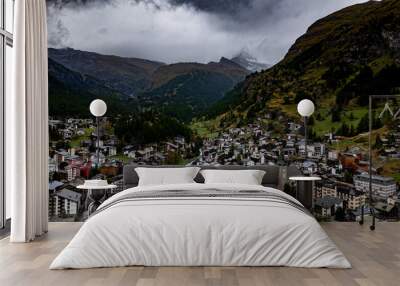 View on the misty mountain peak of Matterhorn from the town of Zermatt in Switzerland Wall mural