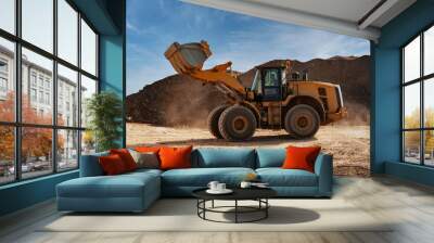 Wheeled loading shovel tractor moving rocks in a quarry Wall mural