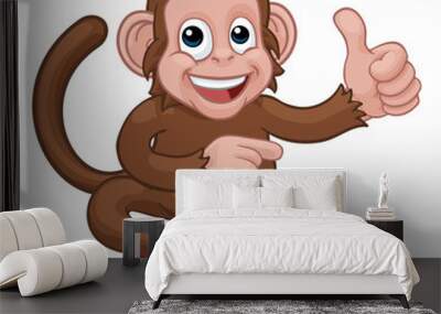 A monkey cute happy cartoon character animal giving a thumbs up and pointing Wall mural