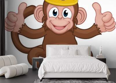 A monkey king cute happy cartoon character animal wearing a crown giving two thumbs up Wall mural