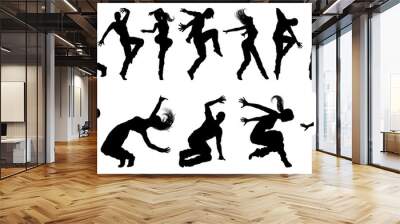 A set of men and women street dance hip hop dancers in silhouette Wall mural