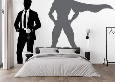 A superhero business man revealed by his shadow silhouette as a super hero in a cape Wall mural