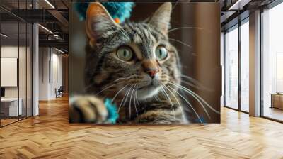 Close-up of a Cat Playing A playful cat batting Wall mural