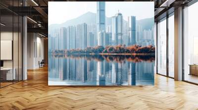 City Skyline,  A modern city skyline featuring minimalistic buildings with reflective surfaces set against a soft blue background, ideal for visuals and design Wall mural