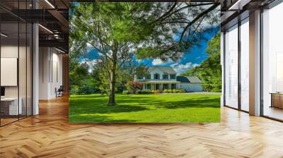 Single family home with large lawn, trees and landscaping Wall mural