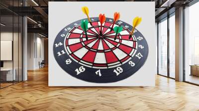 The picture shows a black background dart board with white and red circles with Arabic numerals 1 to 20. There are green, orange and yellow darts used to hit the high numbers for a good score. Wall mural