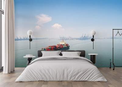 container ship sails out of the harbor Wall mural