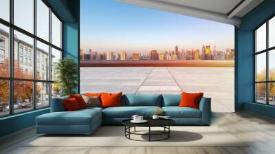 empty floor with skyline and buildings in sunrise Wall mural