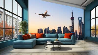 modern city skyline with airplane Wall mural