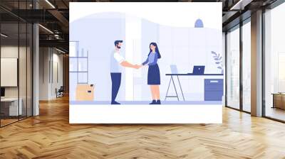 A business meeting with two professionals shaking hands in an office setting, symbolizing agreement and collaboration. Wall mural