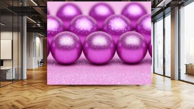 A close-up view of shiny purple spheres arranged in a row on a matching background. Wall mural