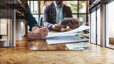 A group of business women and men discuss investment and insurance development in a meeting room of the office. Wall mural