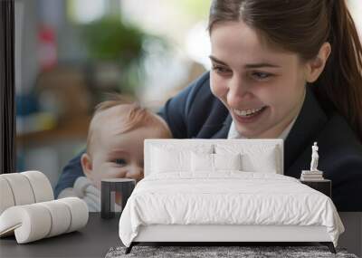 A personable businesswoman in a classic suit is smiling while playing with her cute baby in the living room at home. Wall mural