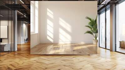 A small living room with white walls, hardwood and a small potted plant. Morning sunlight shines in. Wall mural