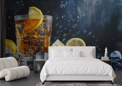 photograph of Glass of ice tea with lemon and ice cubes, cold summer Wall mural