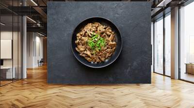 bulgogi on a black concrete background, traditional korean food, view from above Wall mural