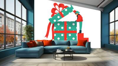 Christmas gift box concept of boy opening present Wall mural