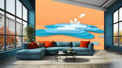 Paper cut fish jumping in water puddle concept Wall mural