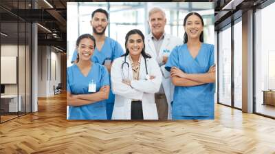 Portrait, people and healthcare with confident in hospital for medical service, collaboration and career pride. Smile, staff and arms crossed with team leadership, about us and treatment for wellness Wall mural