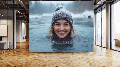 adult woman happily swimming in a winter lake, taking a selfie amidst the beautiful snowy landscape, peaceful and serene outdoor adventure with nature’s winter beauty and reflection Wall mural