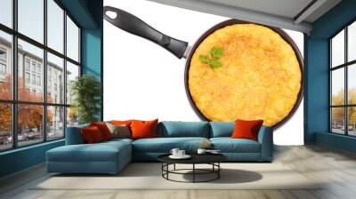 Spanish potato omelette in the frying pan. Clipping path Wall mural