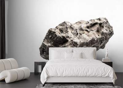 A detailed study of a meteor fragment reveals its distinctive textures and surfaces set against a pristine white backdrop for scientific analysis. Wall mural