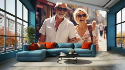 Elderly couple joyfully exploring city streets in spring. Wall mural