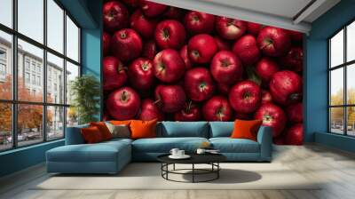 Numerous crimson apples, delectable and succulent, with apple backdrop and superior image. Wall mural