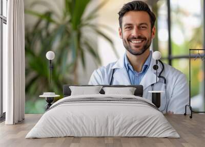 Smiling male physician in white lab coat and stethoscope holding good test results, against white backdrop with blank area for text, promoting good health. Wall mural