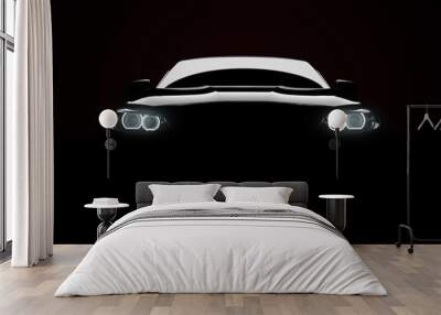 Front view of a generic and brandless modern car with lights on a black background Wall mural