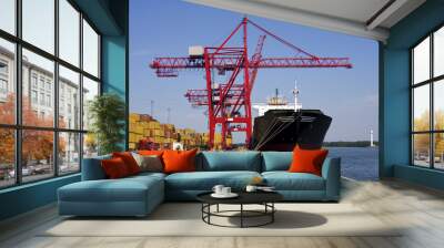 giant container crane unloading a ship in a major port. Wall mural