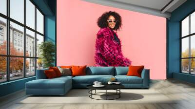 Black woman in a black faux fur jacket, Close up fashion portrait of crazy hipster African girl with funny curly hairstyle and vivid faux fur coat, urban trendy style. Horizontal.copy space Wall mural