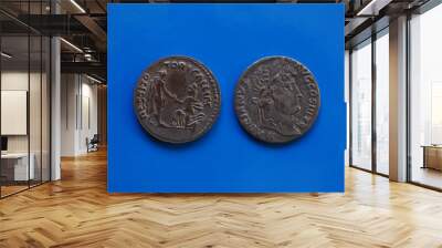 vintage Roman coin over blue Wall mural