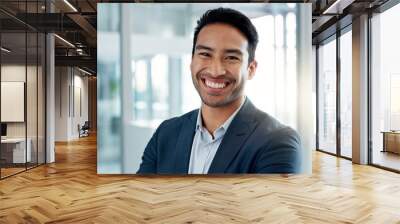 Asian business man, arms crossed and face in office, smile and pride for leadership, management and professional. Financial advisor, businessman and happy in portrait, suit and ambition in workplace Wall mural