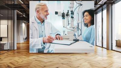 Eye exam, consulting and smile with doctor and black woman for healthcare, ophthalmology and medical. Glaucoma, laser and wellness with patient and optometrist in clinic for vision, checklist or help Wall mural