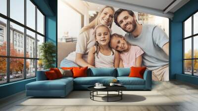 Home, portrait and mother with father, kids and happiness with support, bonding together and cheerful. Face, family and children with parents, care and love with a smile, cheerful and joy in a lounge Wall mural